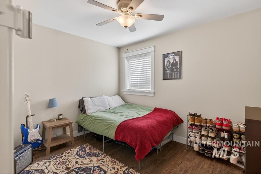 1342 Bristol Road Moscow, ID 83843 - Photo 20 of 26 Bedroom featuring dark wood-style flooring and a ceiling fan