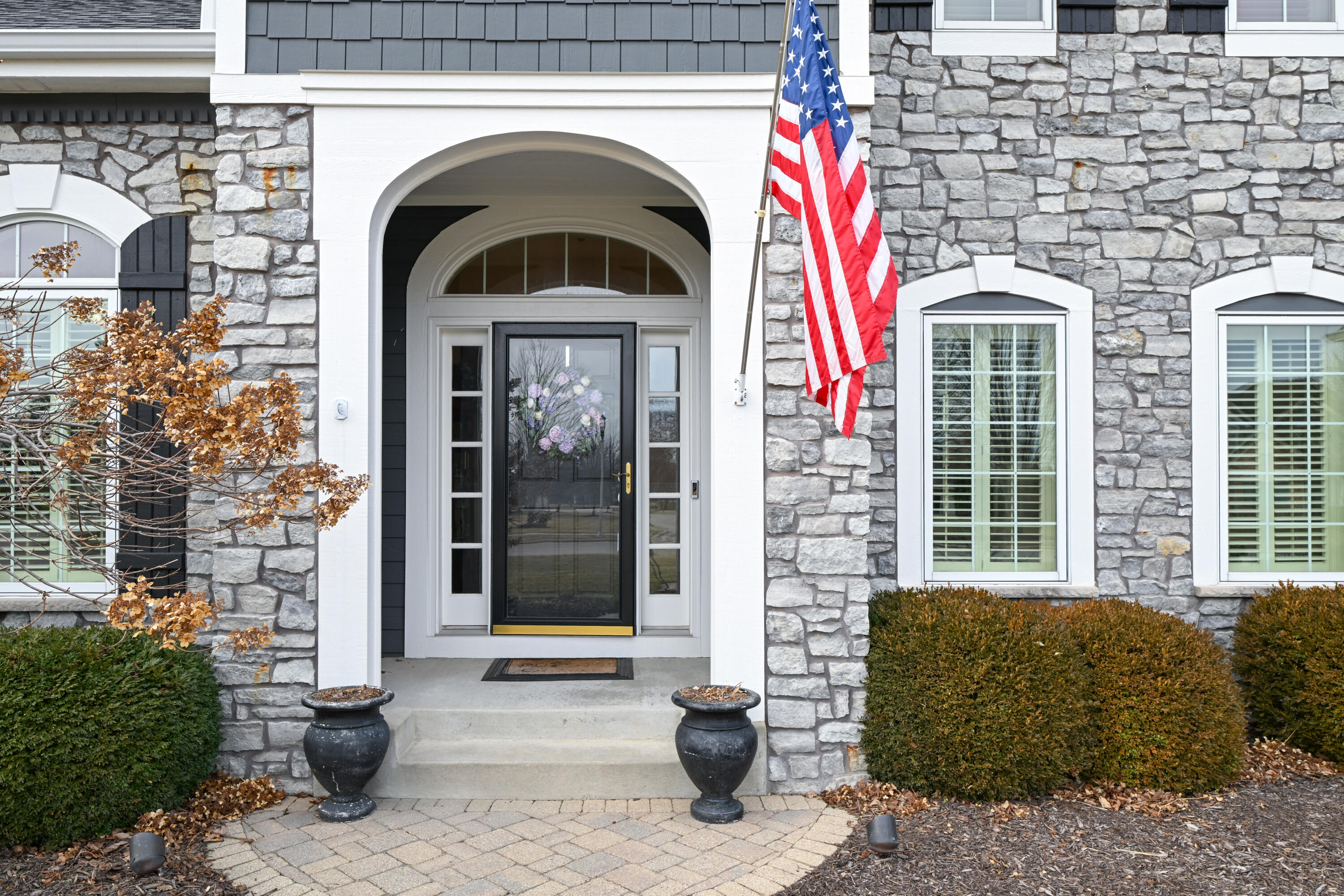 1260 4 Winds Way Hartland, WI 53029 - Photo 4 of 56 Charming covered porch