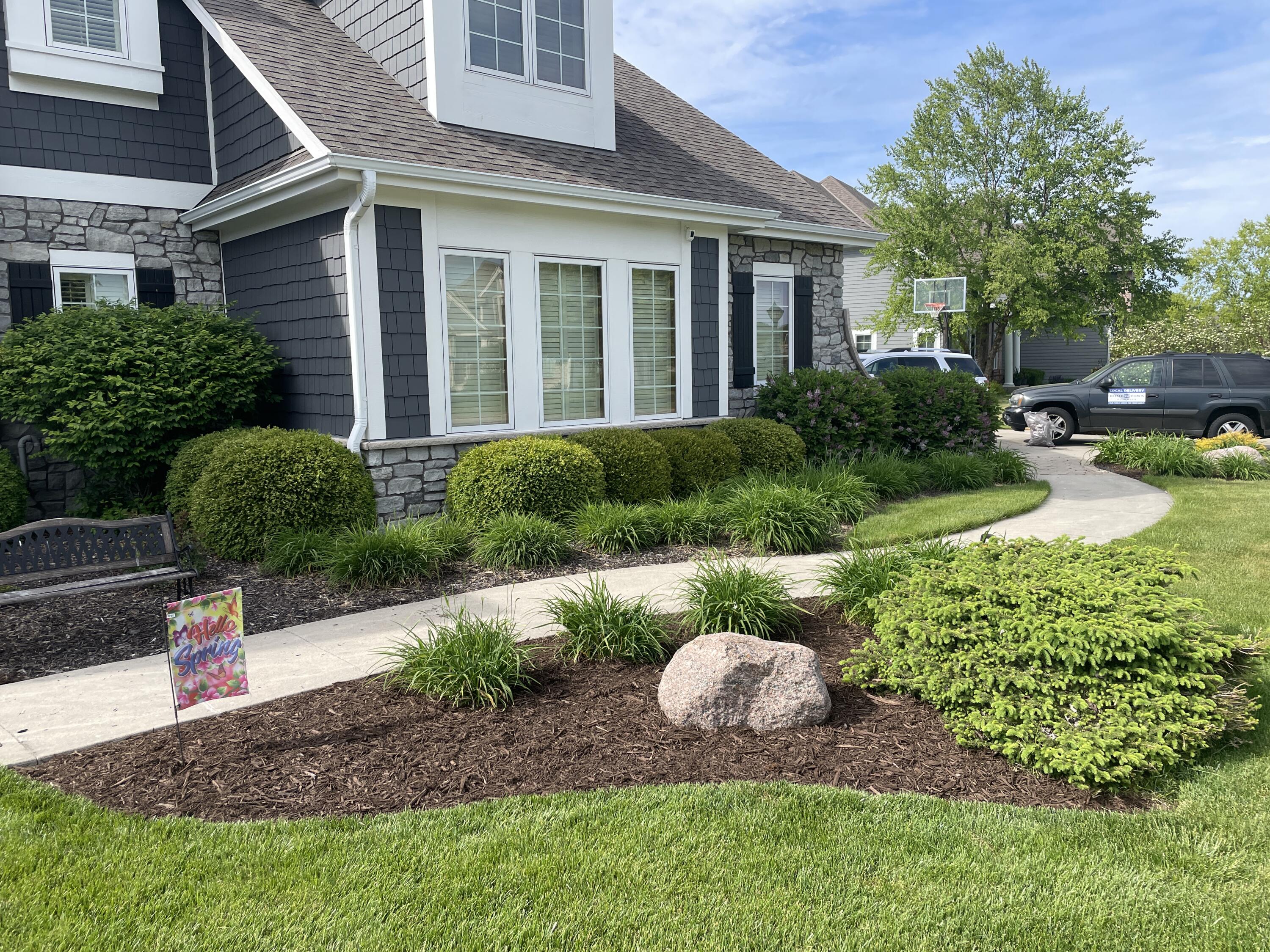 1260 4 Winds Way Hartland, WI 53029 - Photo 6 of 56 Manicured landscaping