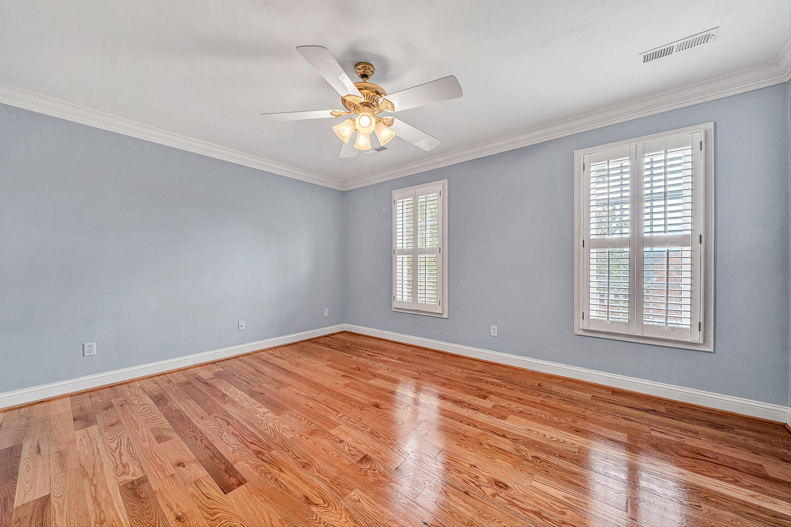 8317 Cardington Drive Roanoke, VA 24019 - Photo 27 of 43 a view of an empty room with wooden floor and a window