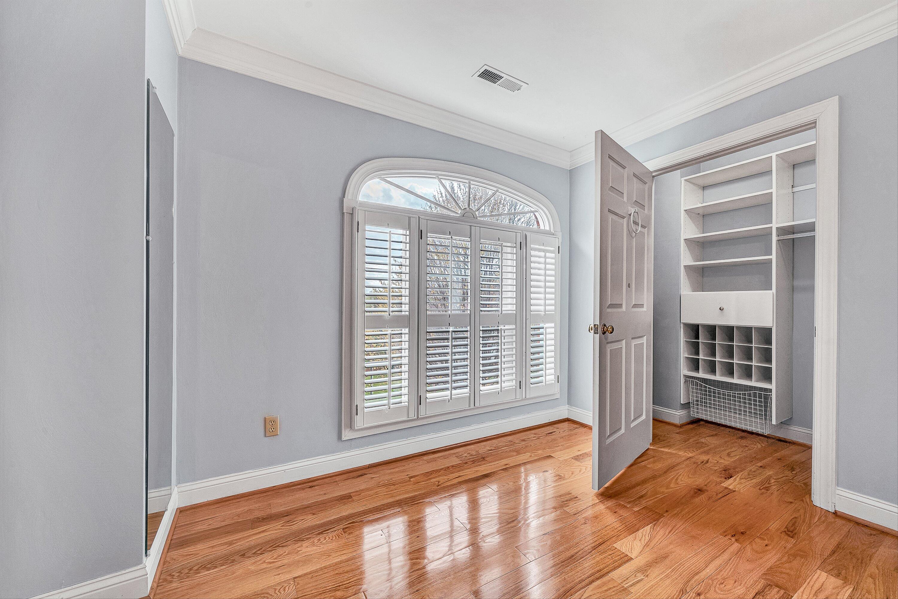 8317 Cardington Drive Roanoke, VA 24019 - Photo 30 of 43 a view of empty room with wooden floor and fan