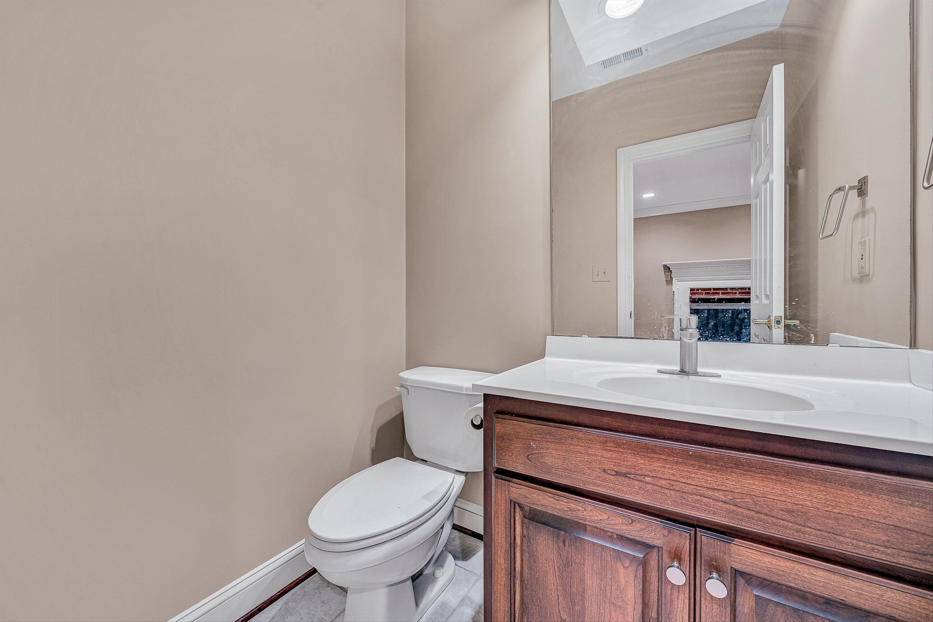 8317 Cardington Drive Roanoke, VA 24019 - Photo 35 of 43 a bathroom with a sink and a toilet