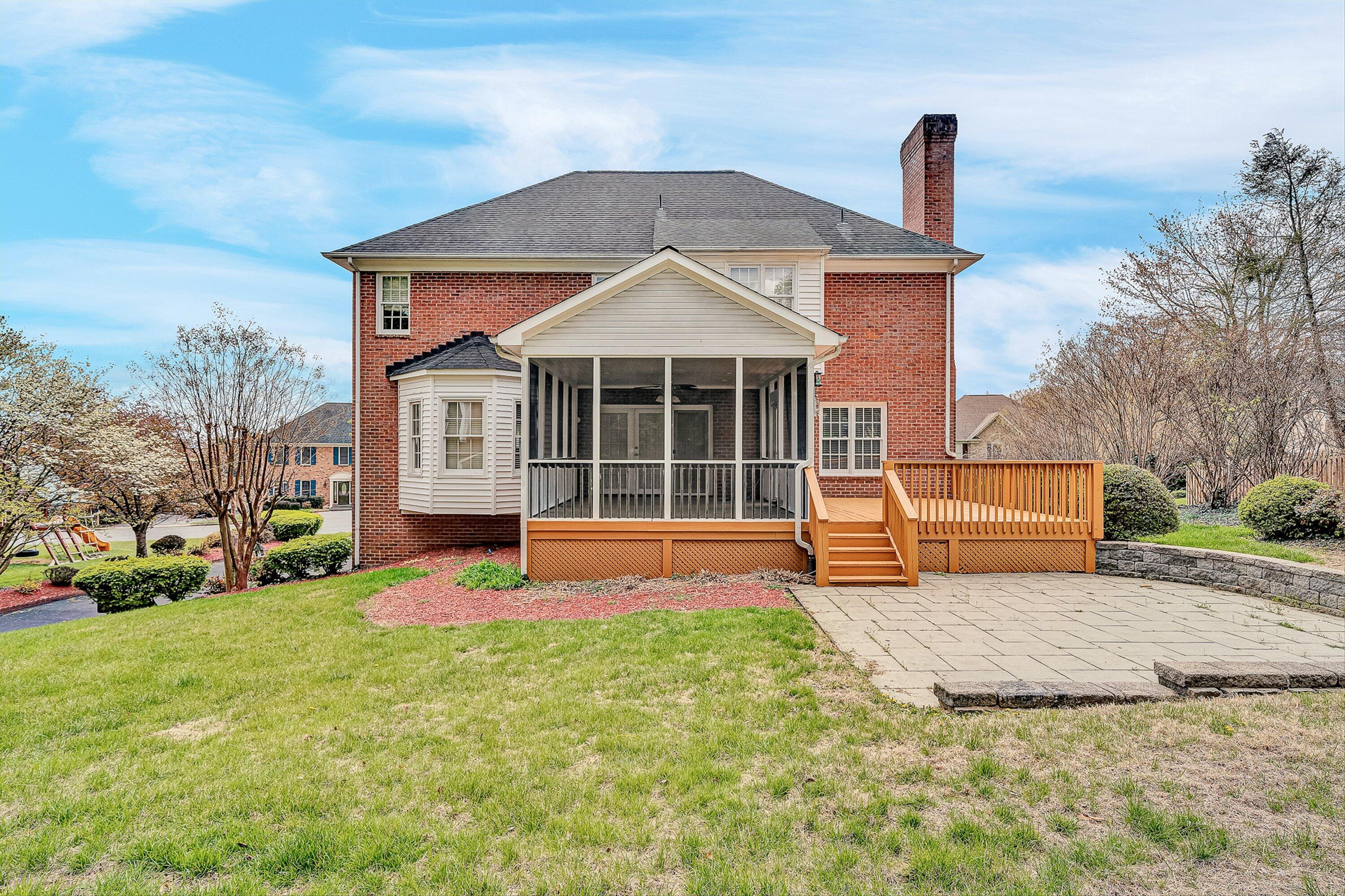 8317 Cardington Drive Roanoke, VA 24019 - Photo 42 of 43 a front view of a house with a yard and garage