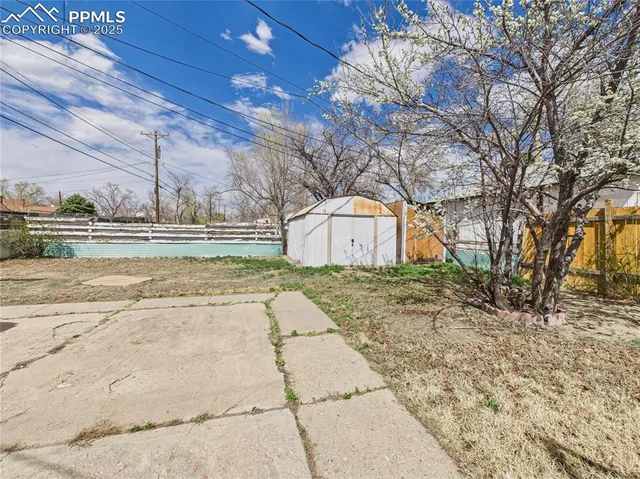 a house with trees in front of it