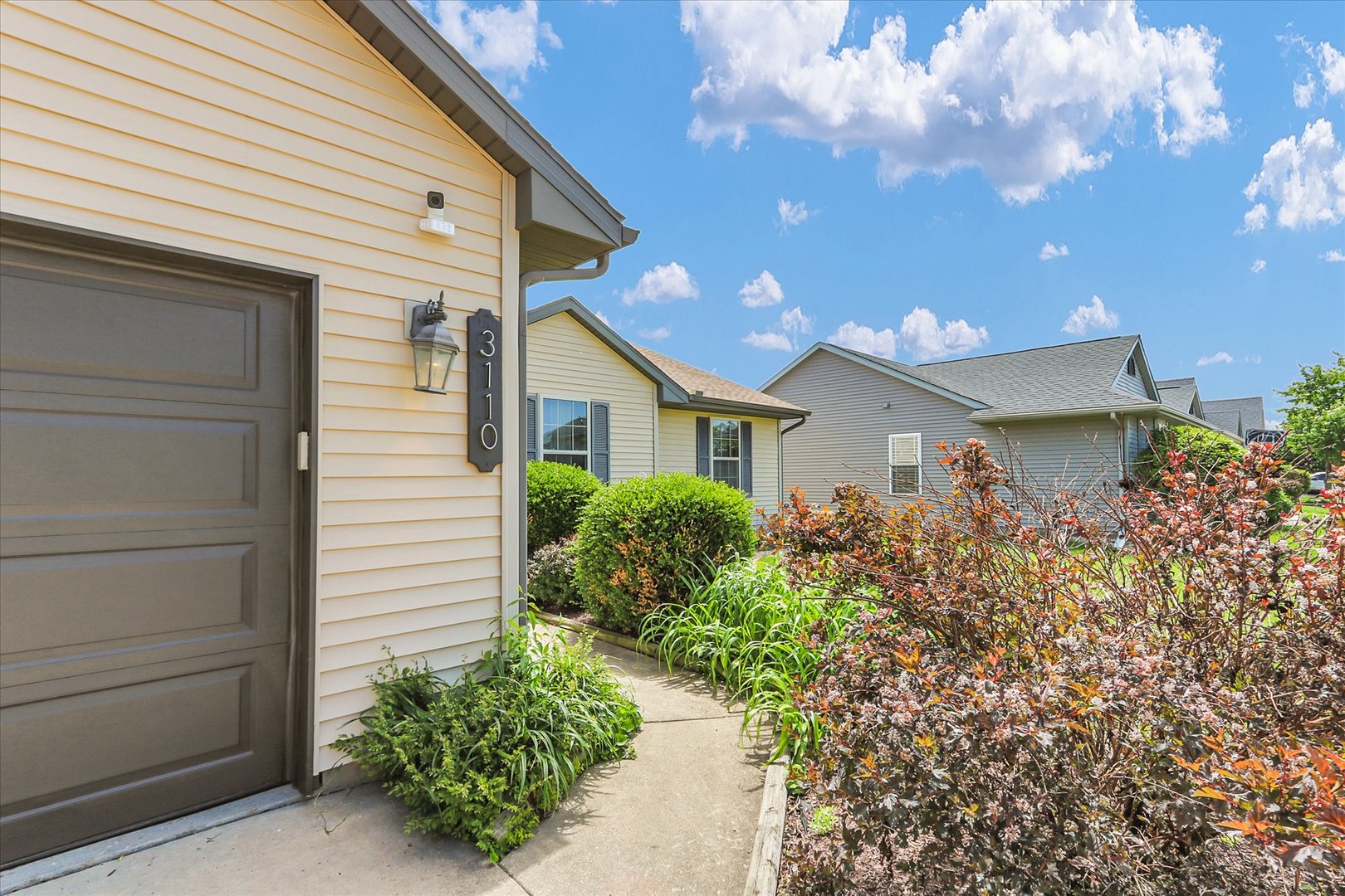 3110 Ridge Park Road Urbana, IL 61802 - Photo 22 of 26 a front view of a house with garden