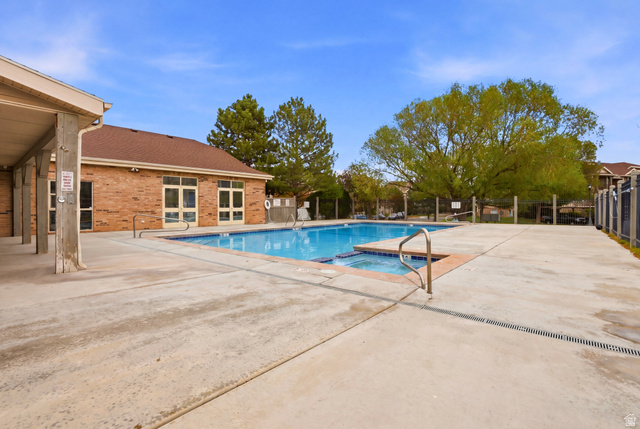 8083 North Ridge Loop East, Unit I 9 Eagle Mountain, UT 84005 - Photo 17 of 17 Integrated pool / spa with a patio area