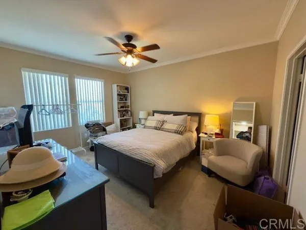 a bathroom with a sink shower and a mirror