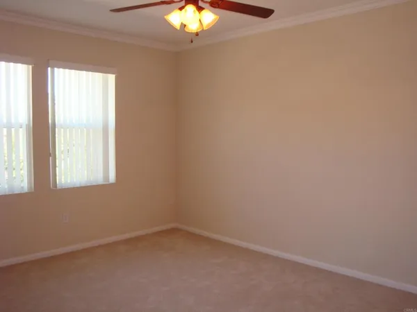 a view of swimming pool from a balcony