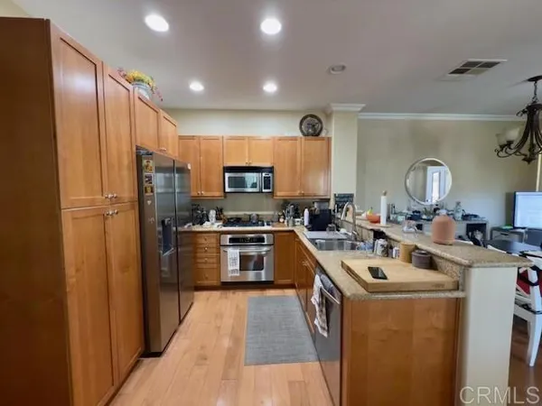 a living room with furniture fireplace and flat screen tv