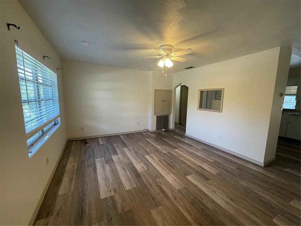 143 East South Street Deland, FL 32724 - Photo 2 of 13 a view of an empty room with a window