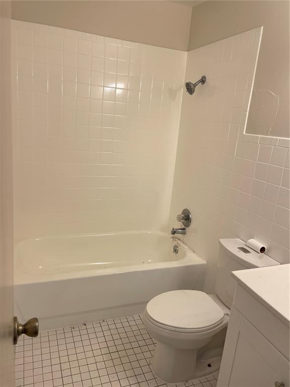 143 East South Street Deland, FL 32724 - Photo 7 of 13 a bathroom with a toilet and a shower