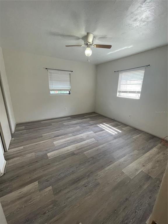 143 East South Street Deland, FL 32724 - Photo 9 of 13 a view of an empty room with a window