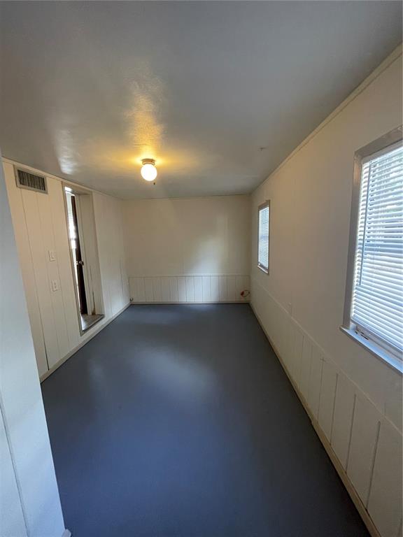 143 East South Street Deland, FL 32724 - Photo 10 of 13 an empty room with windows