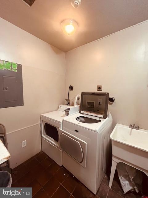 3344 East Baltimore Street, Unit 2 Baltimore, MD 21224 - Photo 11 of 12 a utility room with dryer and washer