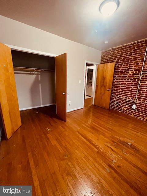 3344 East Baltimore Street, Unit 2 Baltimore, MD 21224 - Photo 7 of 12 a view of empty room with wooden floor
