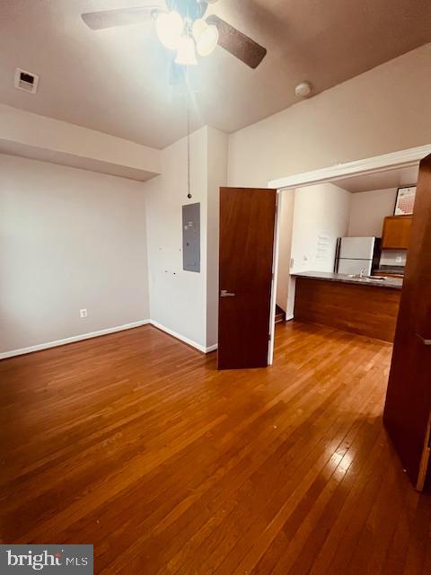 3344 East Baltimore Street, Unit 2 Baltimore, MD 21224 - Photo 8 of 12 a view of empty room with wooden floor