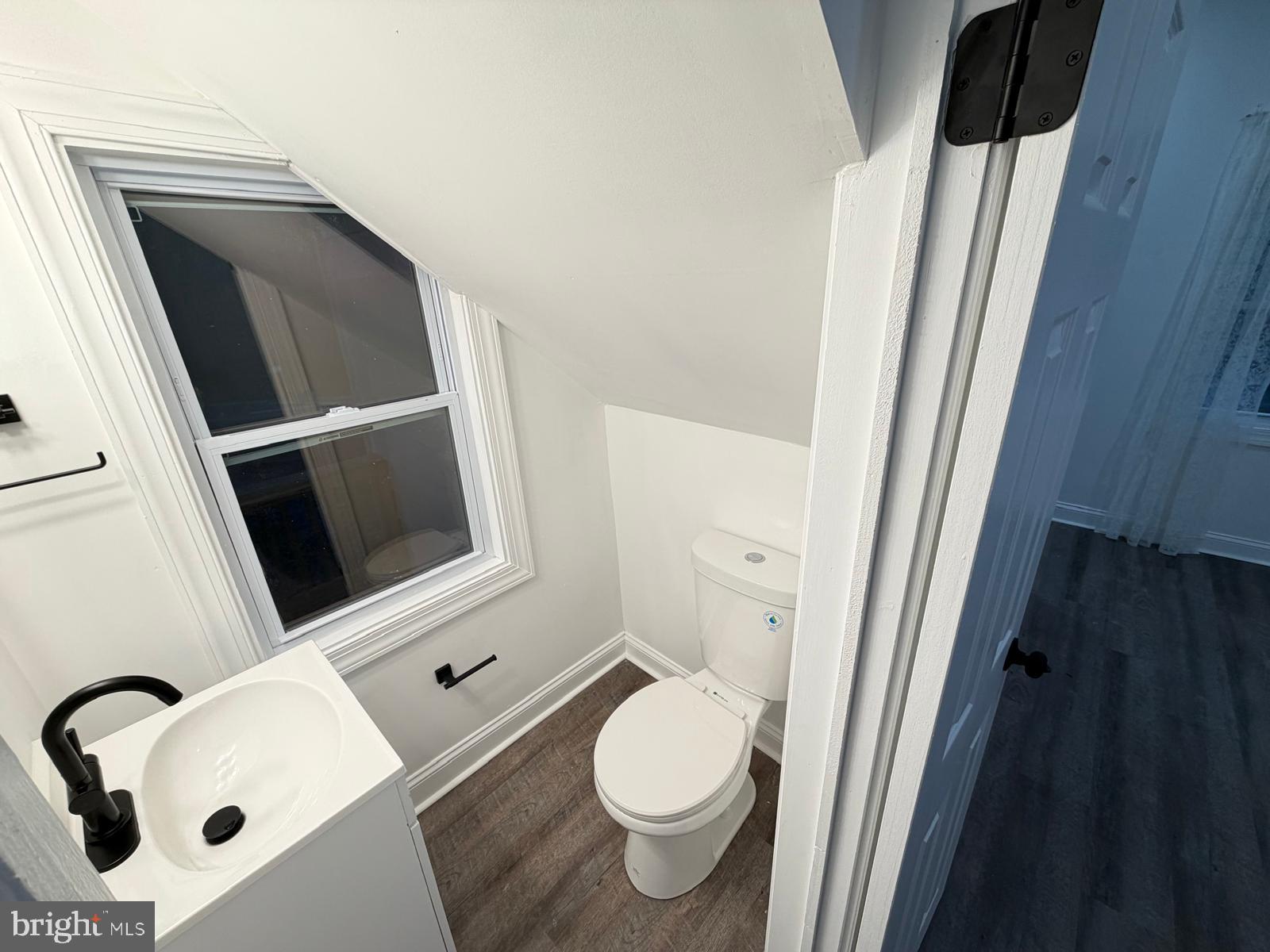 959 Golf Course Road Martinsburg, WV 25404 - Photo 12 of 35 a bathroom with a sink and toilet