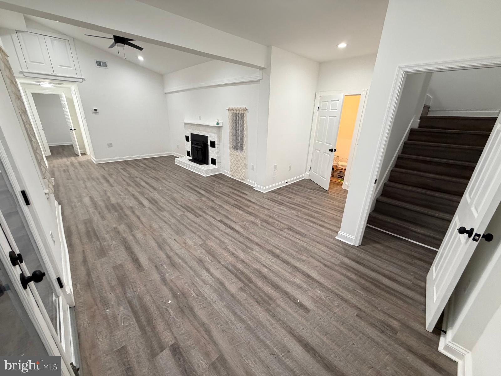 959 Golf Course Road Martinsburg, WV 25404 - Photo 15 of 35 a view of a room with wooden floor and stairs