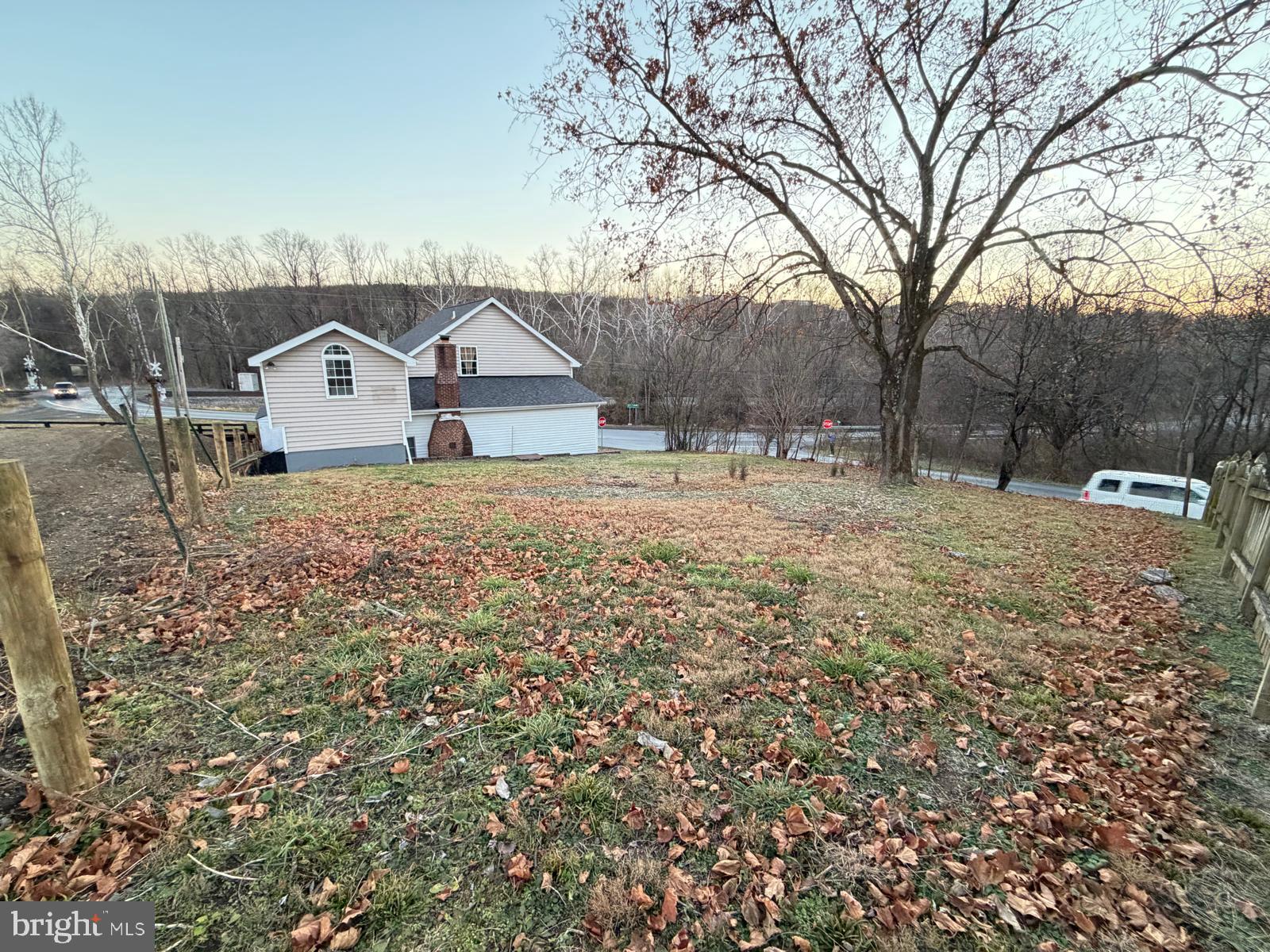 959 Golf Course Road Martinsburg, WV 25404 - Photo 31 of 35 a large house with a large tree in front of it