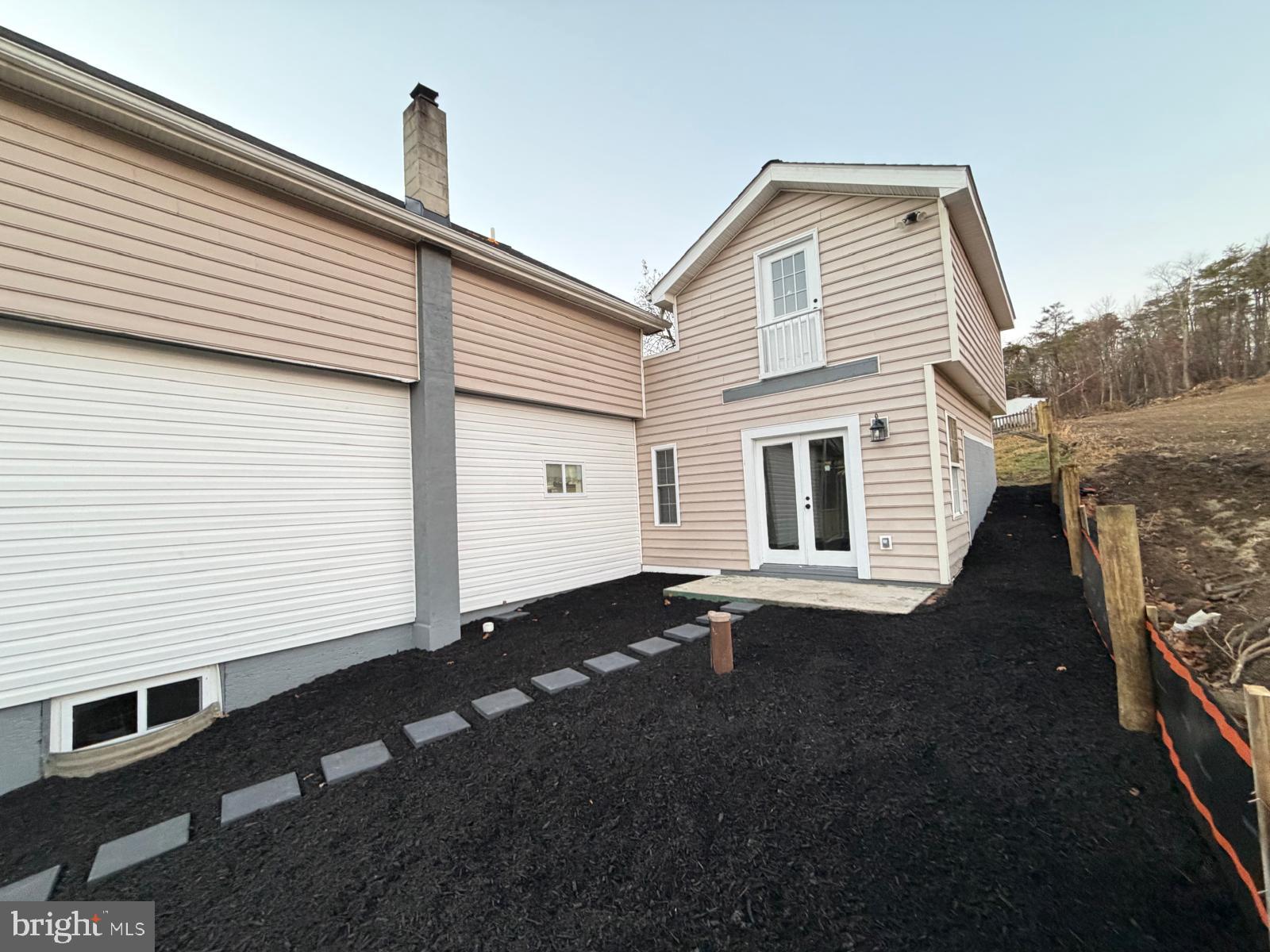 959 Golf Course Road Martinsburg, WV 25404 - Photo 6 of 35 a view of a house with a yard