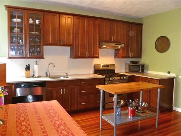 a kitchen with a sink and cabinets