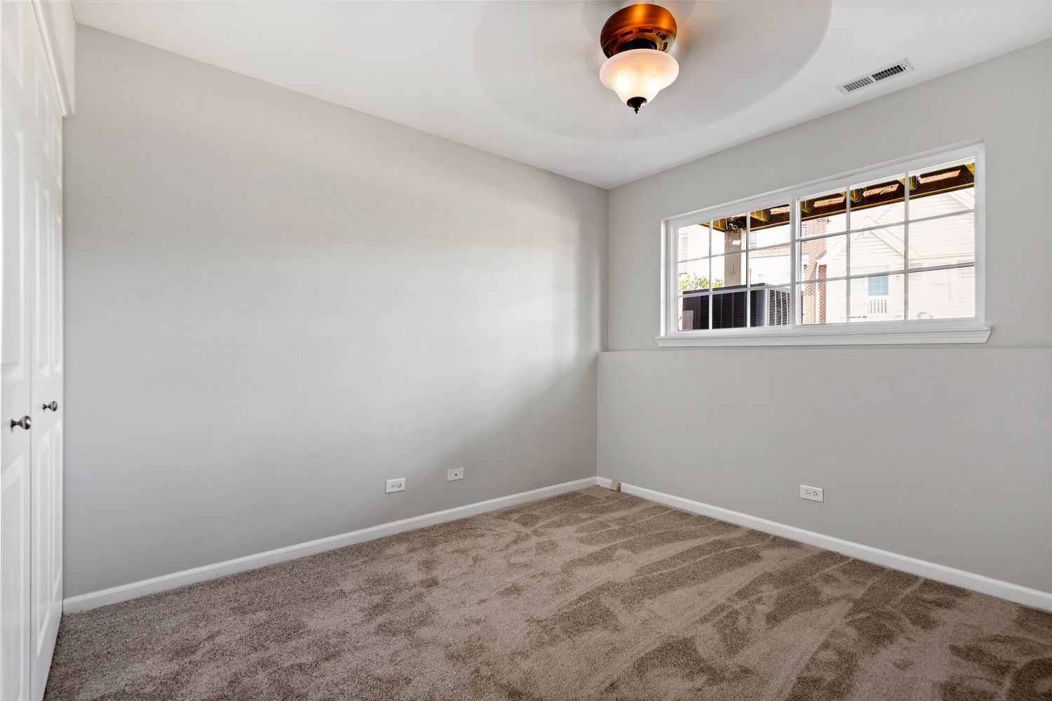 311 Timber Ridge Court Joliet, IL 60431 - Photo 19 of 24 a view of a livingroom with a ceiling fan and window