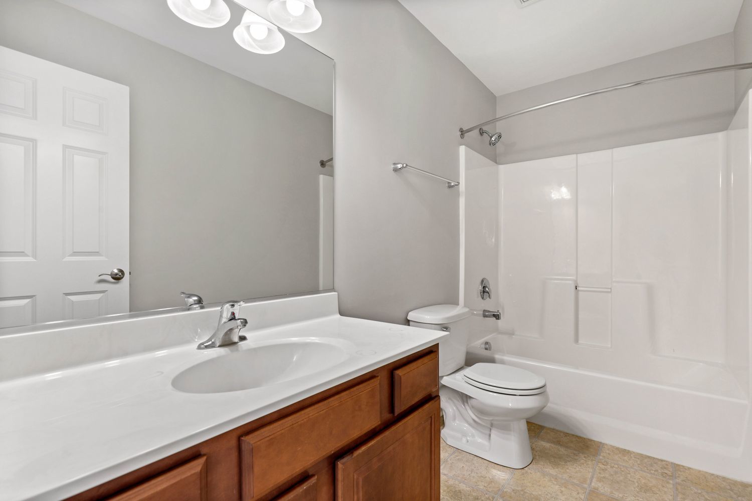 311 Timber Ridge Court Joliet, IL 60431 - Photo 20 of 24 a bathroom with a sink toilet and shower