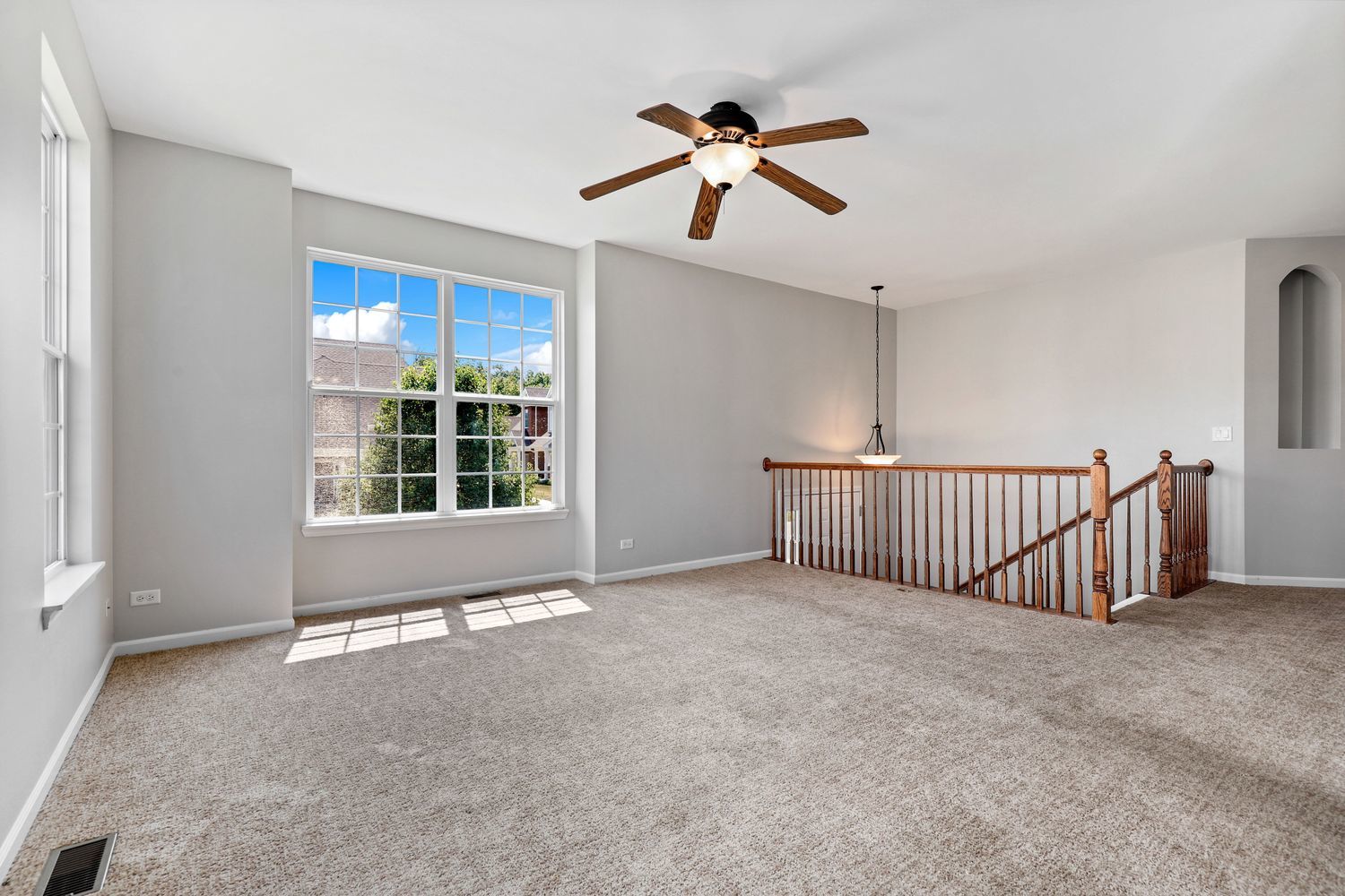 311 Timber Ridge Court Joliet, IL 60431 - Photo 5 of 24 a view of an empty room with a window