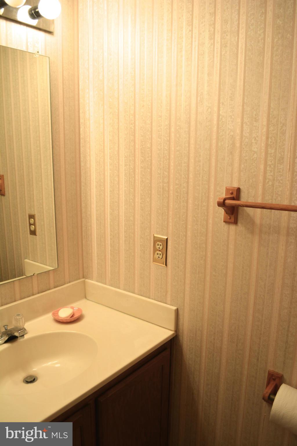 14901 Hatteras Way Silver Spring, MD 20906 - Photo 12 of 30 Powder room (1/2 Bath) on main level