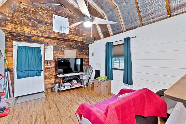 a view of swimming pool with seating space