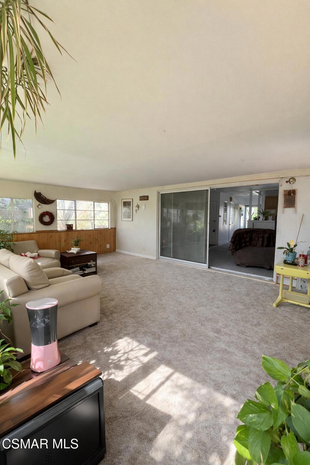 1890 Hamilton Street Simi Valley, CA 93065 - Photo 4 of 14 a living room with furniture and a large window