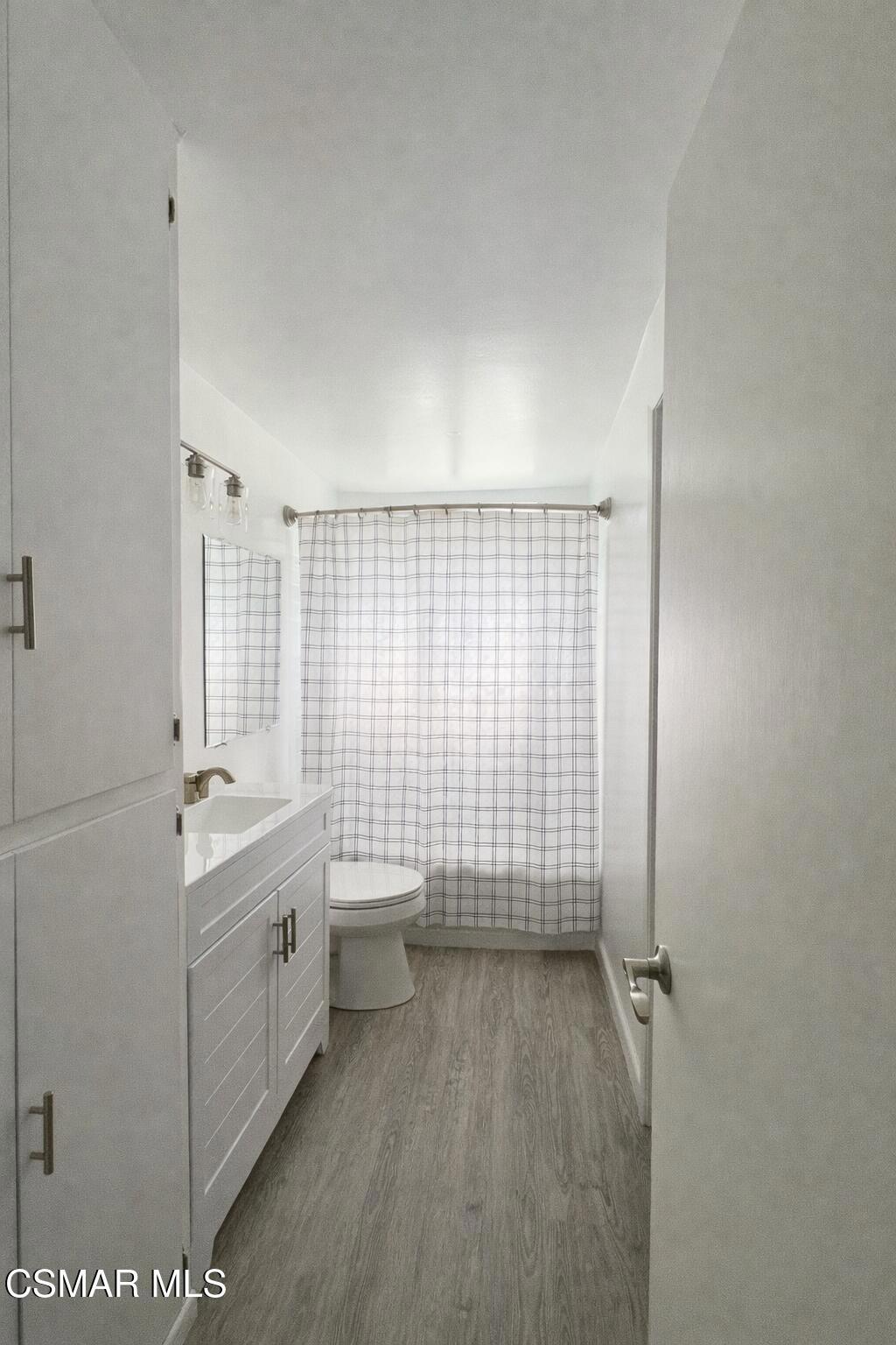 1890 Hamilton Street Simi Valley, CA 93065 - Photo 8 of 14 a bathroom with a sink toilet and shower