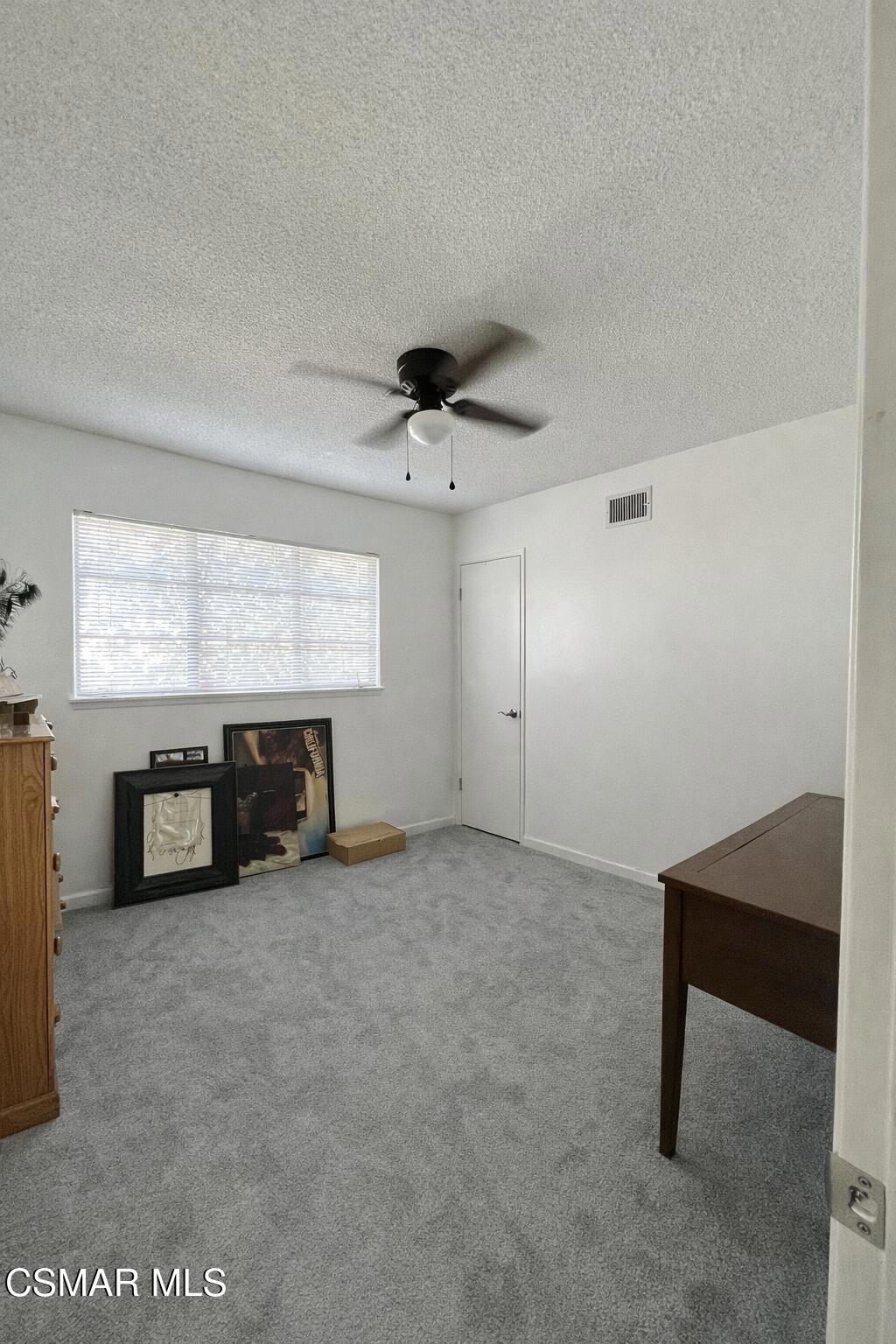 1890 Hamilton Street Simi Valley, CA 93065 - Photo 10 of 14 a view of a room with window and a ceiling fan