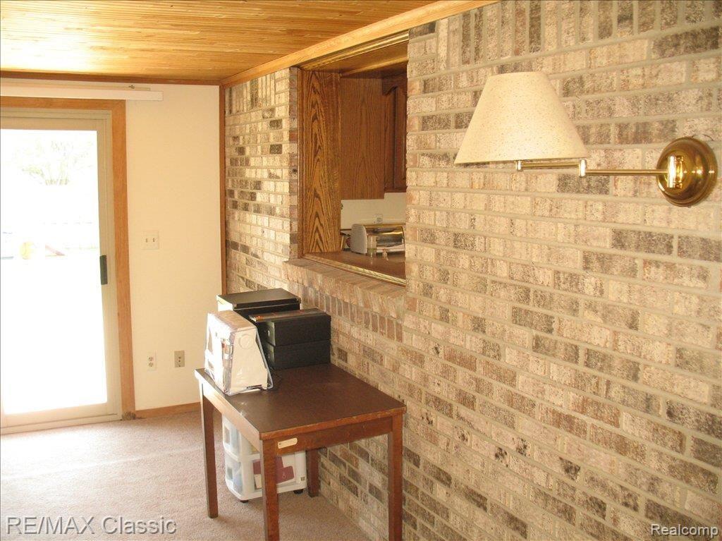 45310 Rudgate Road Canton, MI 48188 - Photo 11 of 25 DEN WITH DOORWALL TO BRICK PAVER