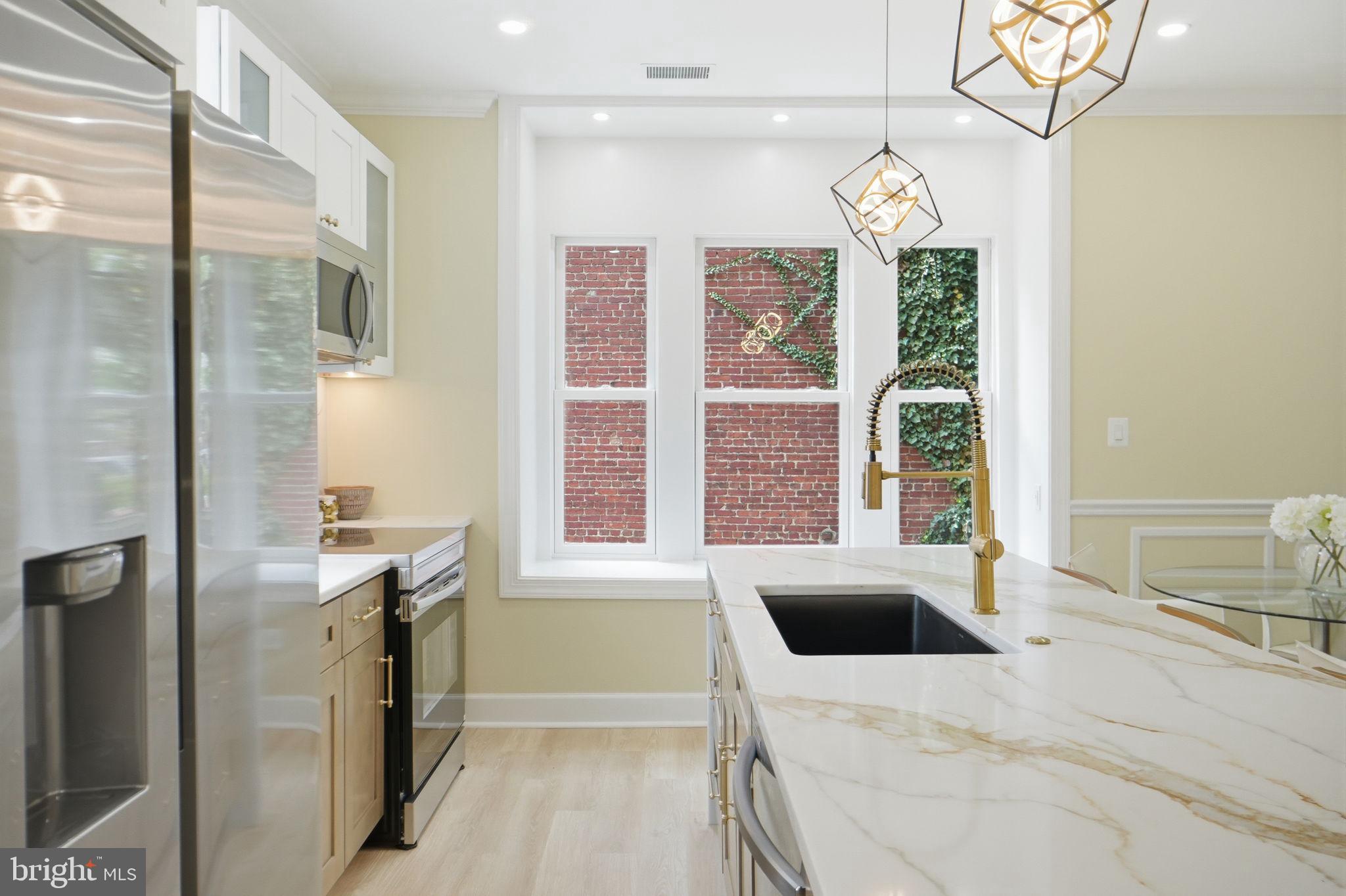 518 Columbia Road Northwest Washington, DC 20001 - Photo 10 of 35 Modern kitchen with elegant finishes.