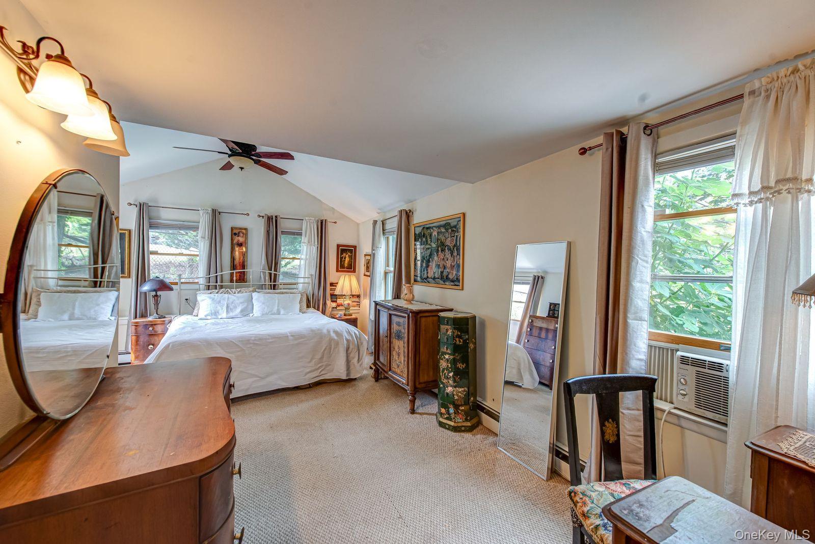 75 Upper Dock Road Kings Park, NY 11754 - Photo 12 of 30 a living room with fireplace furniture and a window