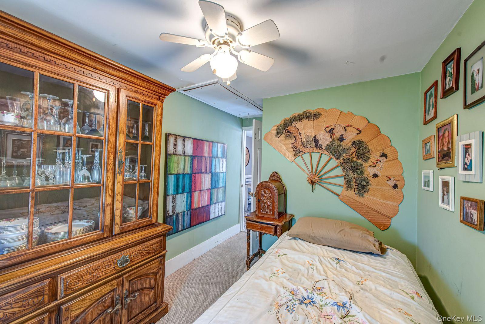 75 Upper Dock Road Kings Park, NY 11754 - Photo 17 of 30 a view of a livingroom with furniture and workspace
