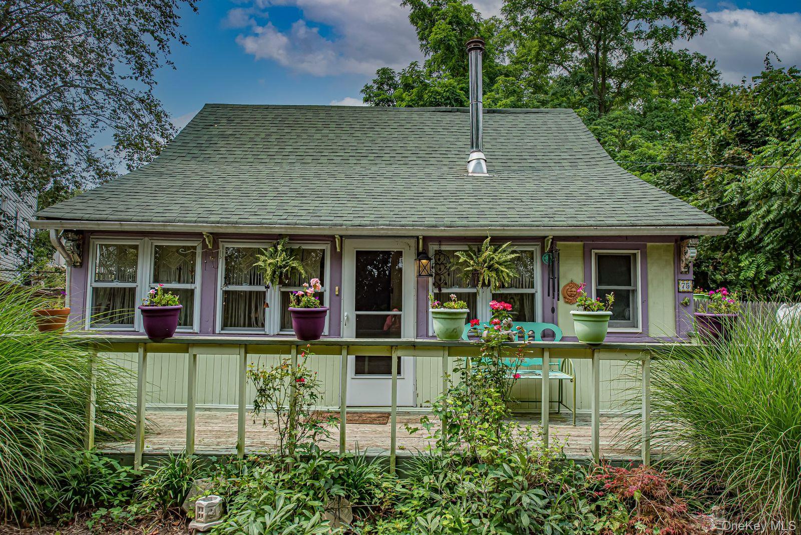 75 Upper Dock Road Kings Park, NY 11754 - Photo 18 of 30 front view of a house with a yard