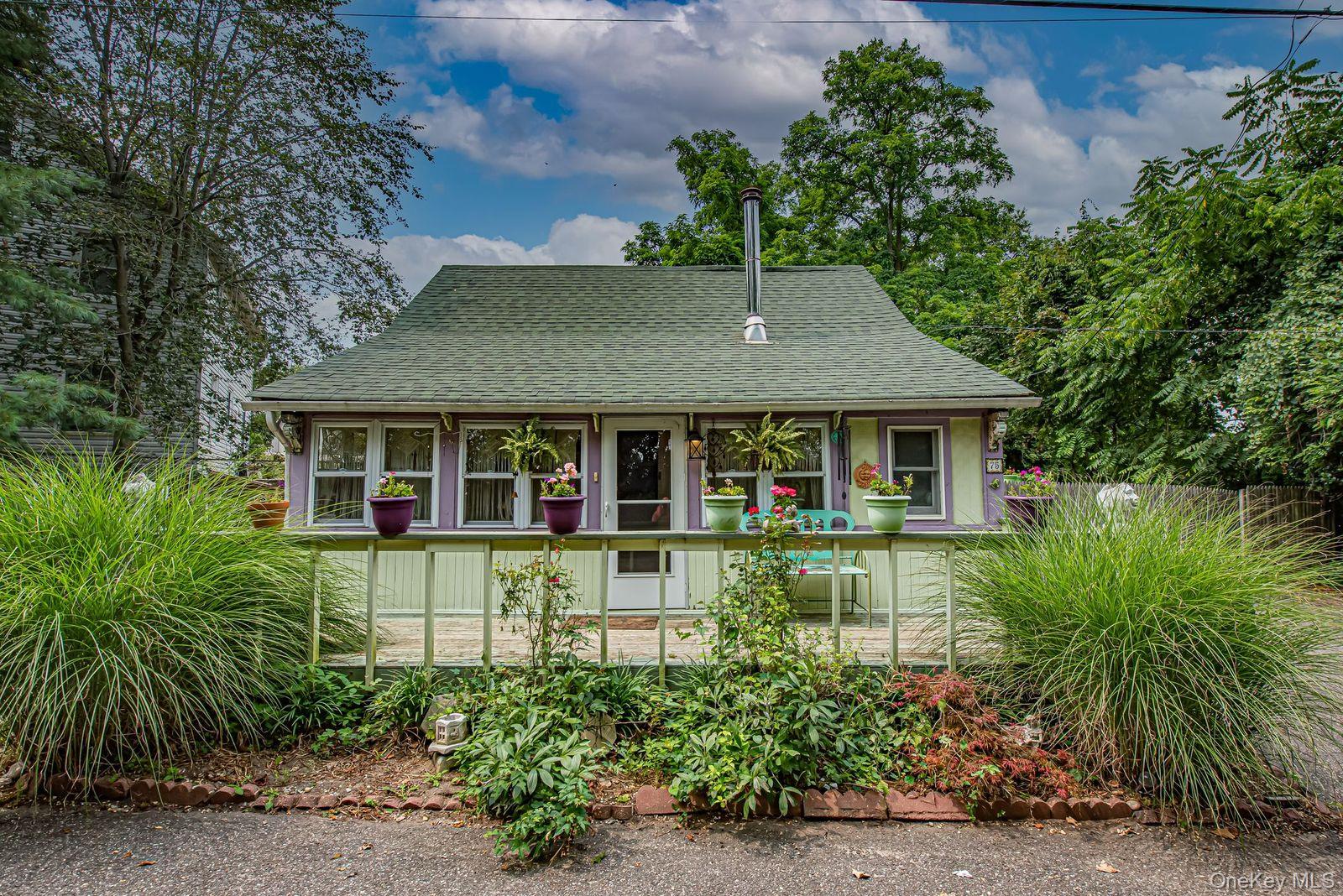 75 Upper Dock Road Kings Park, NY 11754 - Photo 19 of 30 a house view with a garden space
