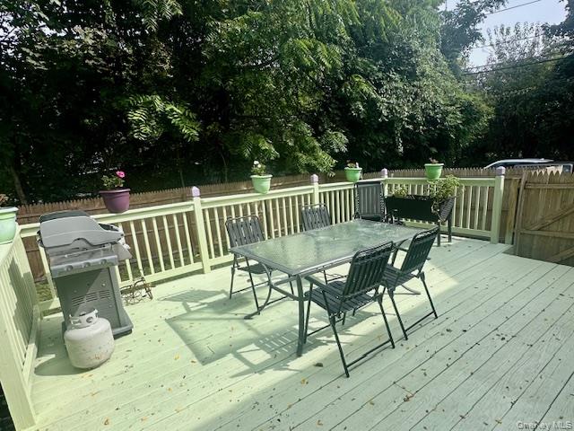 75 Upper Dock Road Kings Park, NY 11754 - Photo 22 of 30 a view of a chairs and table in the patio