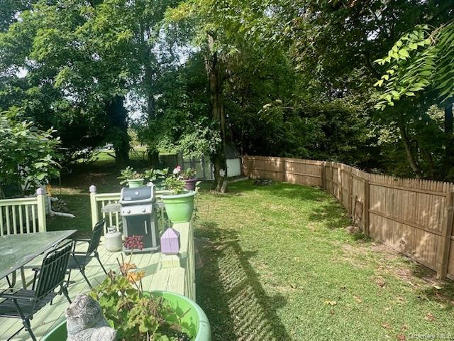 75 Upper Dock Road Kings Park, NY 11754 - Photo 24 of 30 a view of a chair and table on the patio