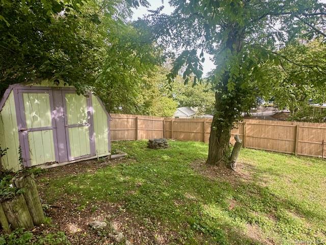 75 Upper Dock Road Kings Park, NY 11754 - Photo 26 of 30 a view of a backyard with large trees
