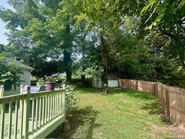 75 Upper Dock Road Kings Park, NY 11754 - Photo 27 of 30 a view of a park with trees in the background