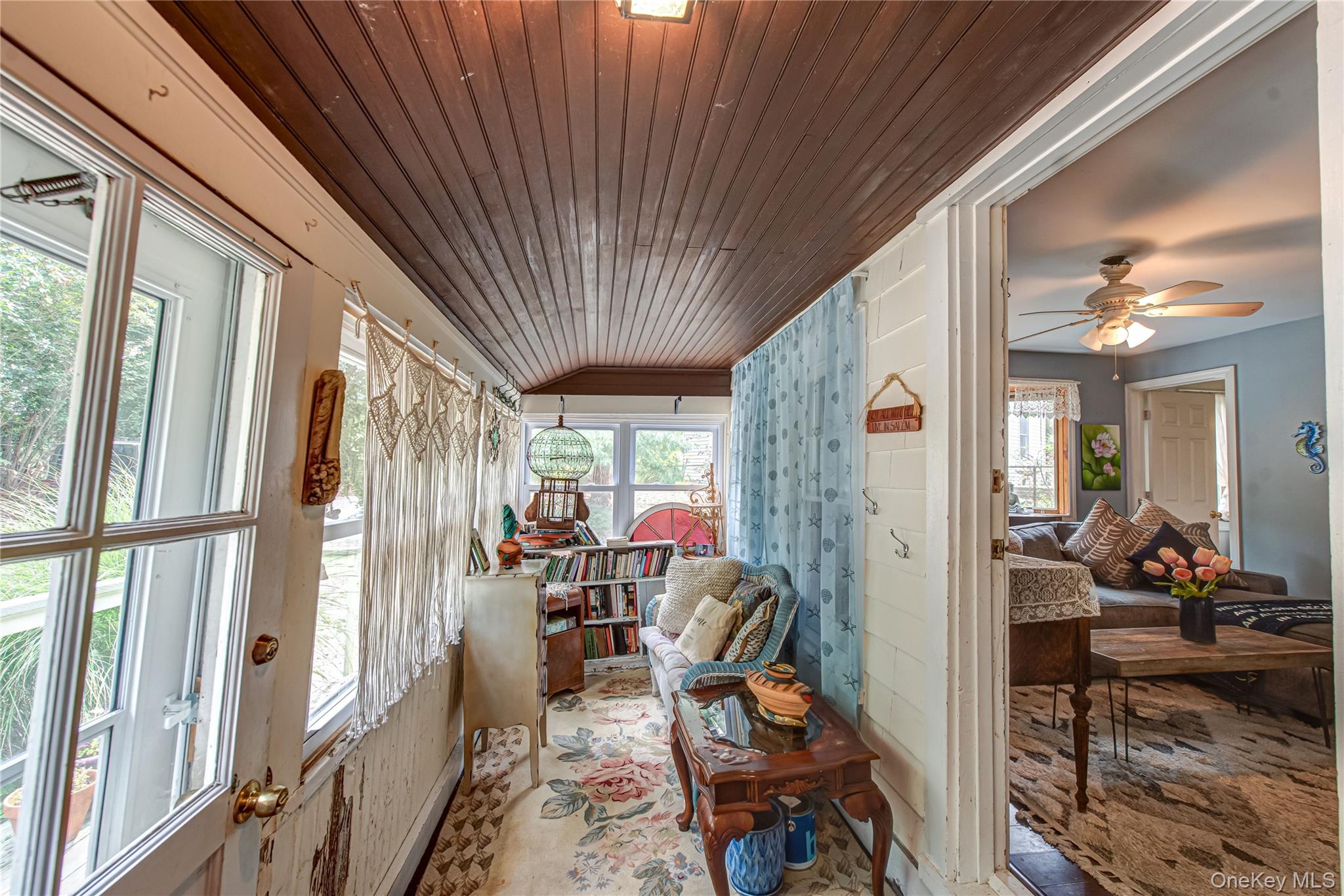 75 Upper Dock Road Kings Park, NY 11754 - Photo 3 of 30 a view of a dining room with furniture window and outside view