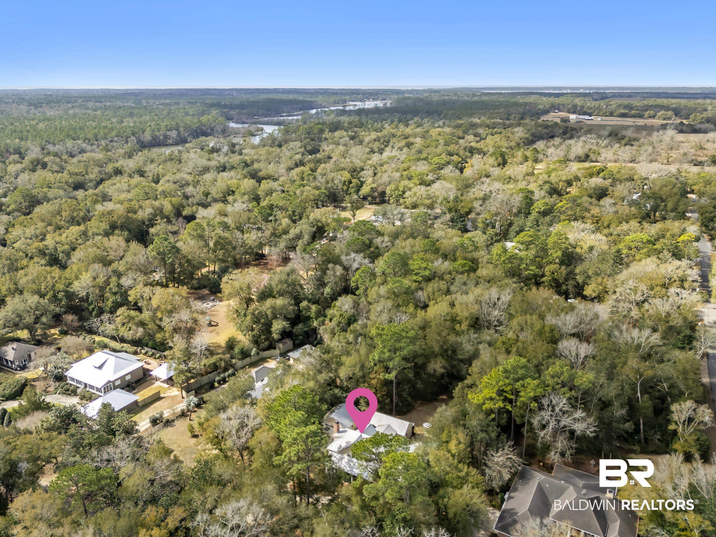 12161 Jessamine Street Magnolia Springs, AL 36555 - Photo 64 of 70 Aerial view of a heavily wooded area