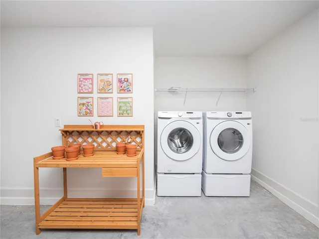 a utility room with dryer and washer