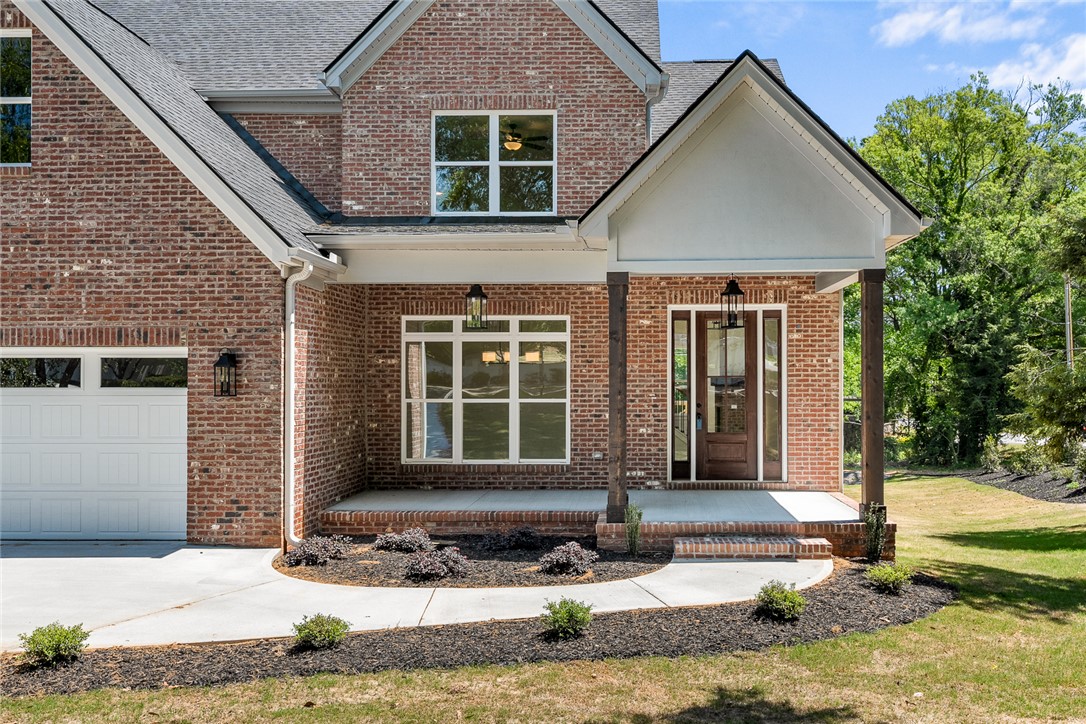 100 Garden Gate Drive Anderson, SC 29621 - Photo 2 of 43 This classic brick residence features a welcoming front porch and a convenient attached garage.