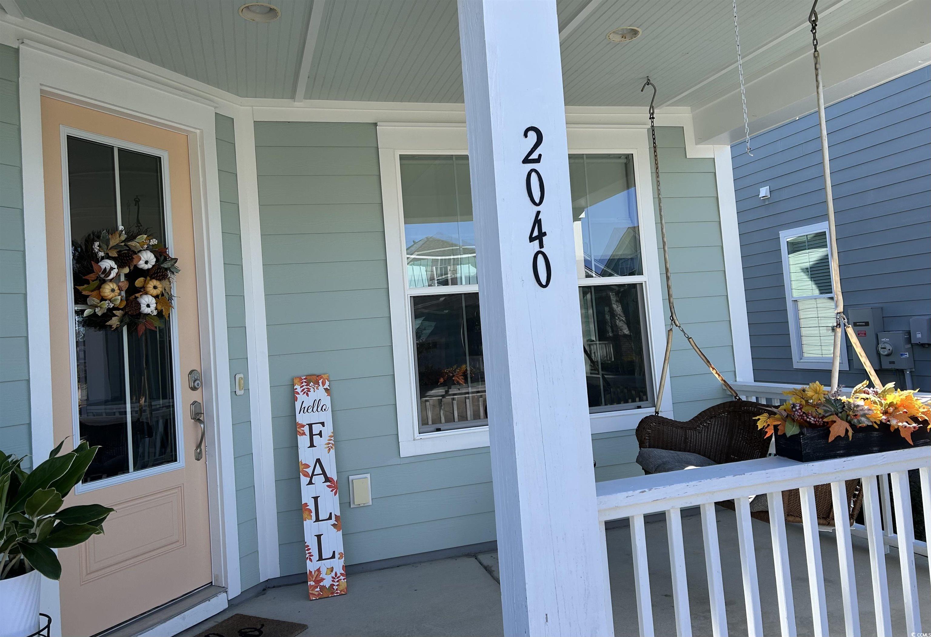 2040 Silver Island Way Murrells Inlet, SC 29576 - Photo 40 of 40 Inviting entrance with cozy porch swing.
