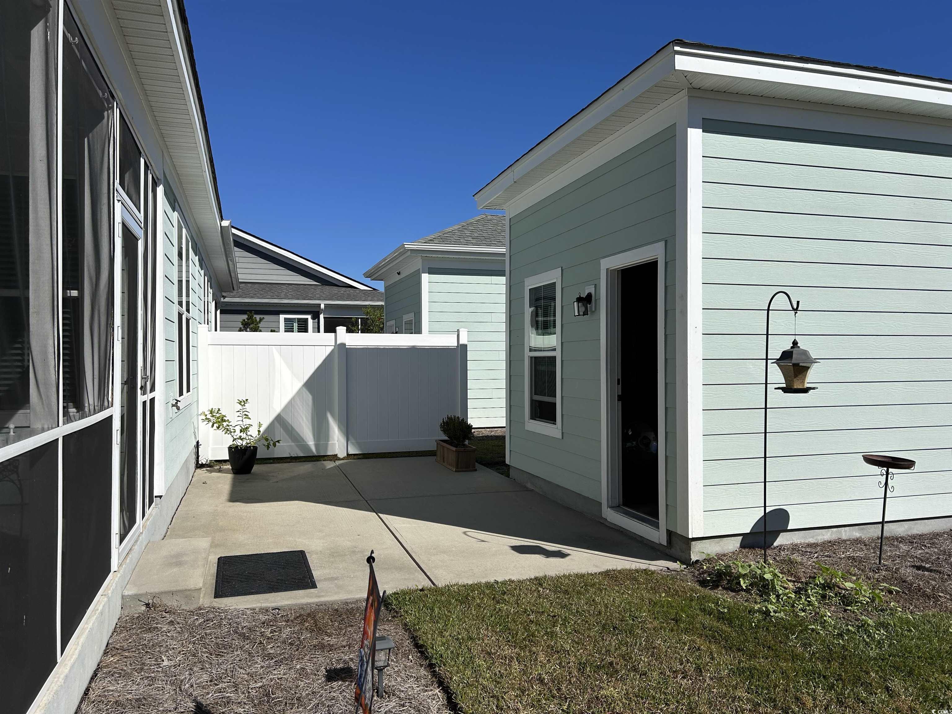 2040 Silver Island Way Murrells Inlet, SC 29576 - Photo 5 of 40 Detached garage and court yard area.
