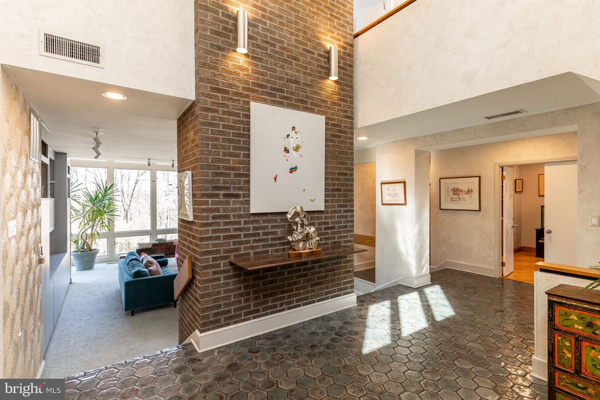 11000 Tara Road Potomac, MD 20854 - Photo 13 of 44 Two- Story Foyer Entrance leading to Family Room